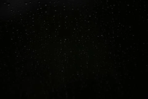 Window with raindrops during rain 12 Stock Photos