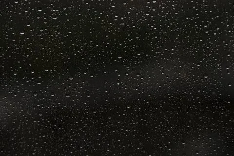 Window with raindrops during rain 13 Stock Photos