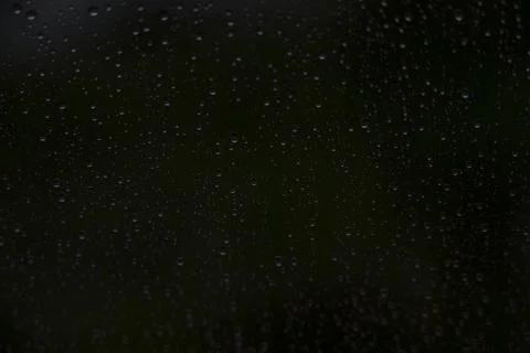 Window with raindrops during rain 14 Stock Photos