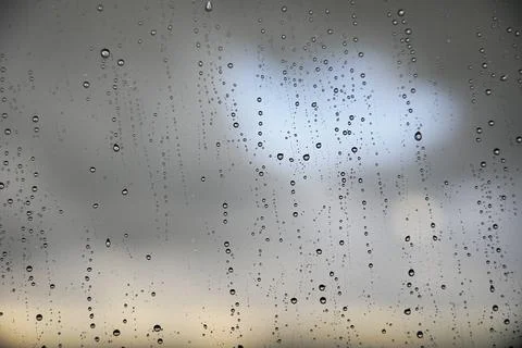 Window with raindrops during rain 4 Stock Photos