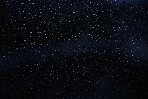 Window with raindrops during rain 5 Stock Photos