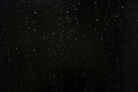 Window with raindrops during rain 8 Stock Photos