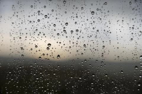 Window with raindrops during rain 9 Stock Photos