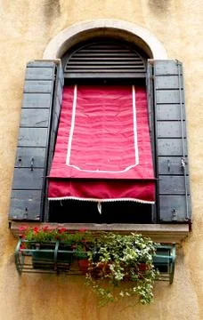 Window, red canopy and old wall Stock Photos