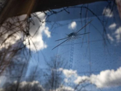 Window reflection of the sky the mark of the shot Stock Photos