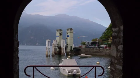 A window on the road wall with view to the Como lake and hotel Olivedo Stock Footage 153374886