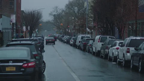 Window roll down revealing traffic passing through brooklyn street Vídeos de archivo 251216946