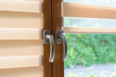 Window roller, duo system day and night - detail.  Cozy home interior. Stock Photos