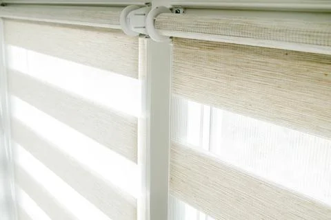 Window roller duo system day and night. Close up on roll curtains indoor. Stock Photos