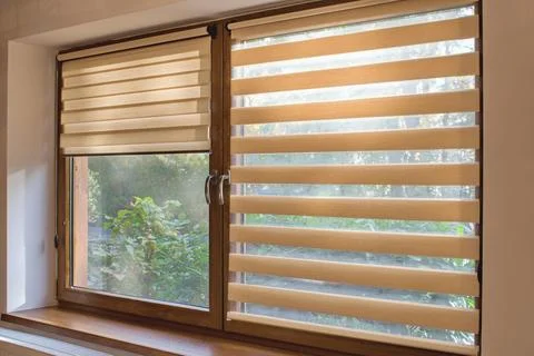 Window roller, duo system day and night. Cozy home interior. Stock Photos