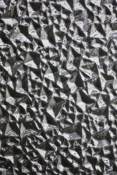 Window rough glass wild surface abstract close up background fine modern ar.. Stock Photos
