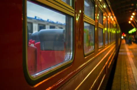 Window with rows of seats in modern suburb commuter train Foto stock