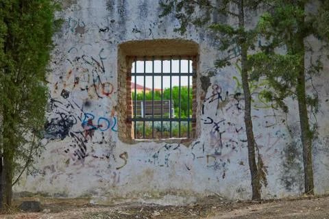 Window with rusty bars and graffiti Stock Photos