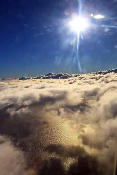 Window seat, a flight in the sunset Stock Photos