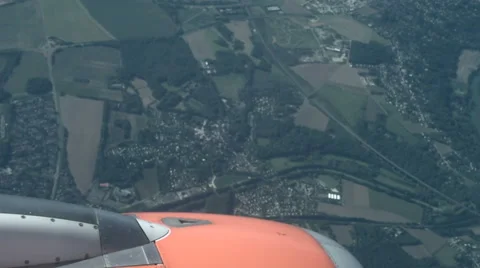 Window seat view - Flying over cultivated land in the UK Video stock 42381049