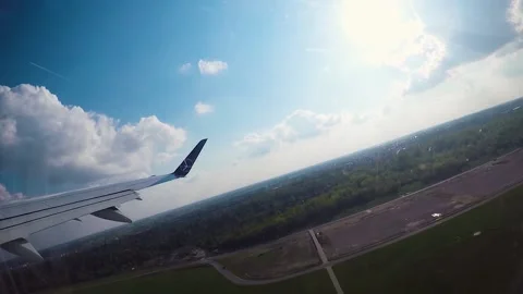 Window seat view plane take off Stock Footage 135393234