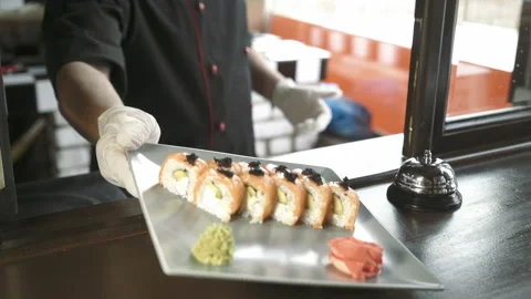 Window serving dishes in the restaurant. Fresh and tasty sushi rolls. Stock Footage 85664723