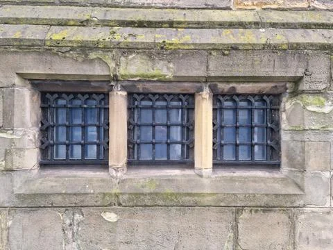 A window set in a stone frame. Foto stock