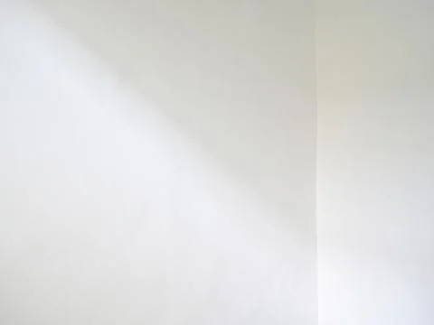 Window shadow and light blur abstract background on white wall Stock Photos