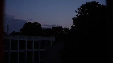 Window Shot of a Red Sunset Sky in Urban Settings, London, England Stock Footage 335077465