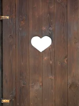 Window shutter with a heart Stock Photos