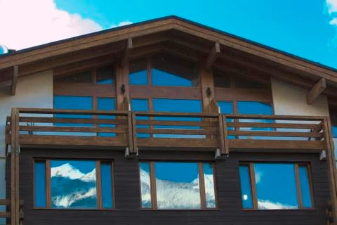 Window shutters of mountain chalet Stock Photos
