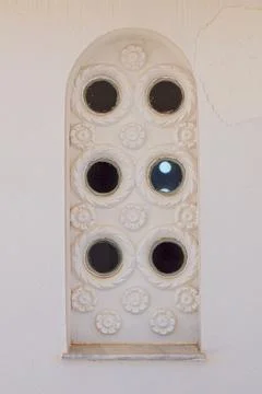 Window on stone building. Stock Photos