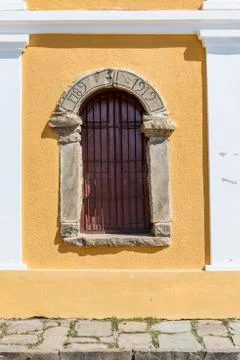 Window with stone frame. 1789 - 1912 Stock Photos