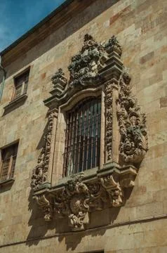 Window on stone wall of old building at Salamanca Stock Photos
