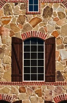 Window on stone wall Foto stock