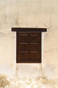 Window on stone wall Stock Photos