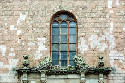 Window on stone wall. Stock Photos