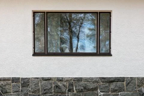 Window on stone wall. Stock Photos