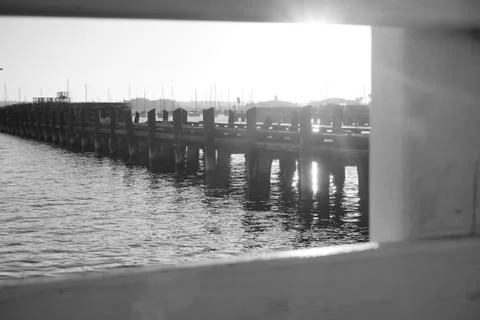 Window to Sunset on the Harbor Stock Photos