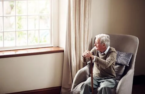 Window, thinking and old man with cane in house, retirement and good memory.. Foto stock