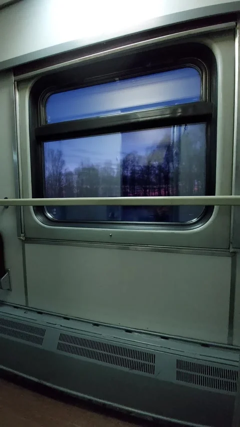 Window of a train car in the evening Stock Footage 270120442