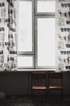 Window with two chairs Stock Photos