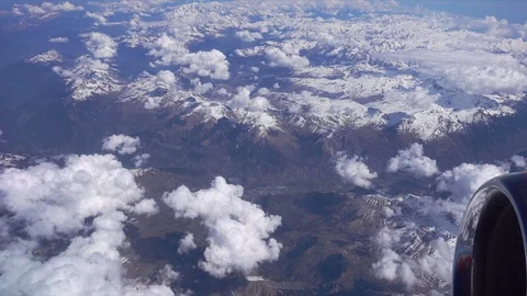 Window view from aeroplane over the Alps, Europe Video stock 100829396