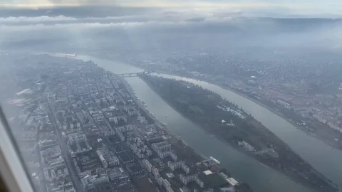 Window view from airplane flying over Budapest, Hungary Stock Footage 119756673
