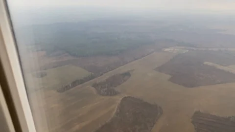 Window view from airplane flying over Belarus Stock Footage 119756894
