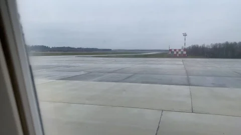 Window view from airplane going on runway Stock Footage 119756937