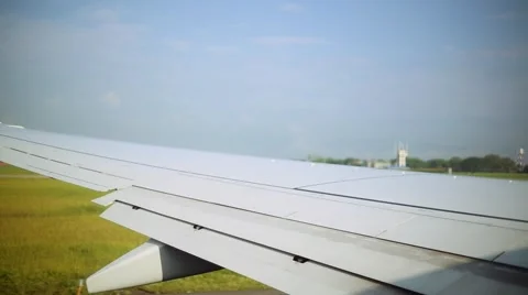 Window view of Airplane as it takes off during the day Stock Footage 49127941