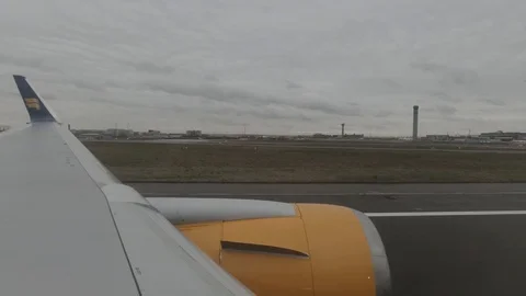 Window view of Airplane Taking off in Paris Stock Footage 130136437