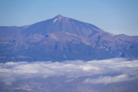 Window view from an airplane on the volcano mountain peak of Pico del Teide.. Stock Photos