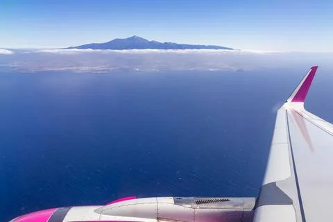 Window view from an airplane on the volcano mountain peak of Pico del Teide.. Stock Photos