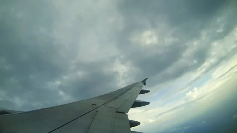 Window view of airplane wing and clouds in Phuket, Thailand, Time lapse Stock Footage 270750464