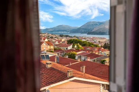 Window view of Argostoli, capital city of Kefalonia and many rooftops Stock Photos