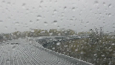 Window View of the Canadian Train during a Rainstorm Stock Footage 92655336