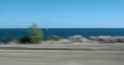 Window View From Car, Bus, Train. Traveling Along the Sea Stock Footage 71187337