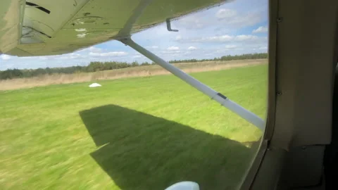 Window view from Cessna aircraft landing in the aerodrome in Lithuania Stock Footage 154047481